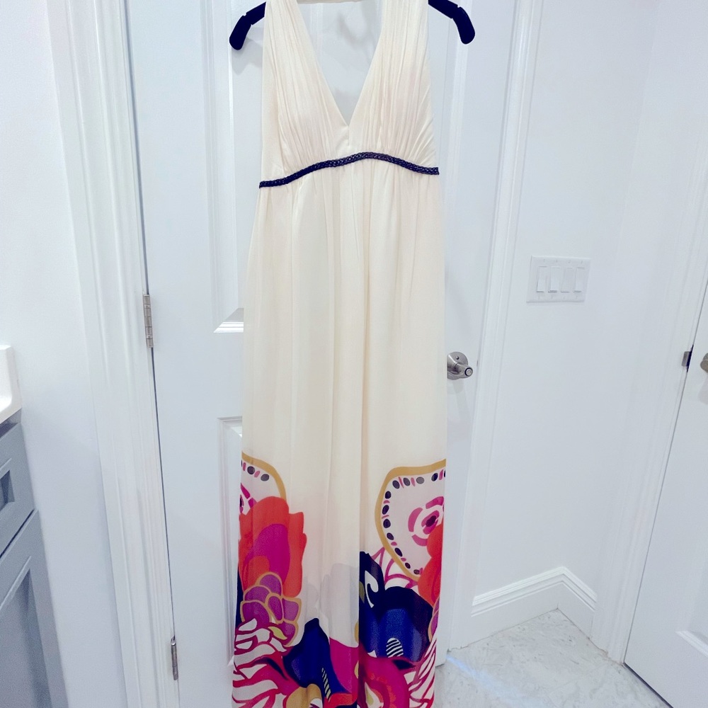 Kay Unger white halter dress with floral design along bottom